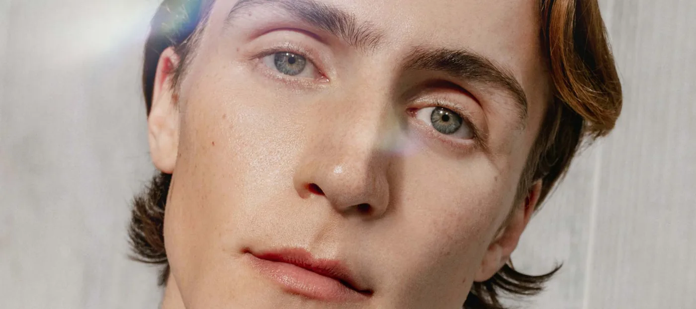 A face in soft prismatic light
